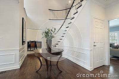 Foyer with curved staircase