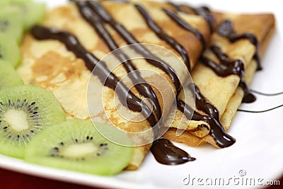 French crepes with chocolate and kiwi