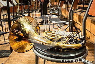 French horn lying on the chair