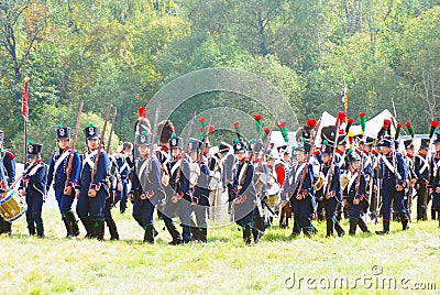 French (Napoleonic) soldiers-reenactors march.