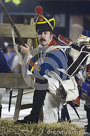 French soldiers firing from a barricade during the Representation of the Battle of Bailen