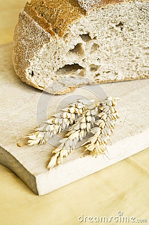 Fresh bread and wheat spikes