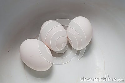 Fresh Eggs On A White Dish