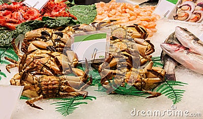 Fresh great crabs, shrimps and lobster at the market