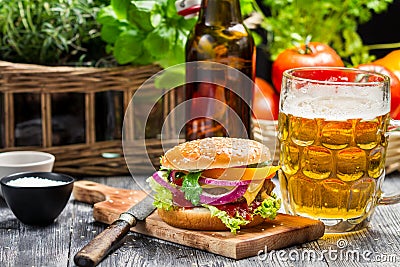 Fresh homemade burger and a cold beer