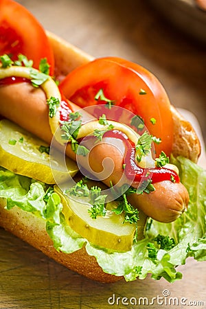 Fresh hot dog with sausage and vegetables