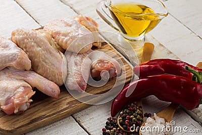 Fresh raw chicken meat on wooden background