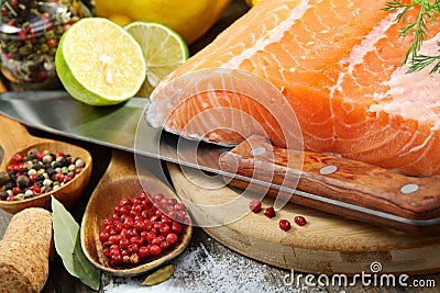 Fresh salmon fillet with herbs and spices.