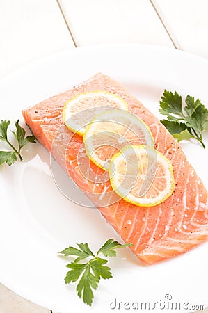 Fresh salmon with spices and lemon