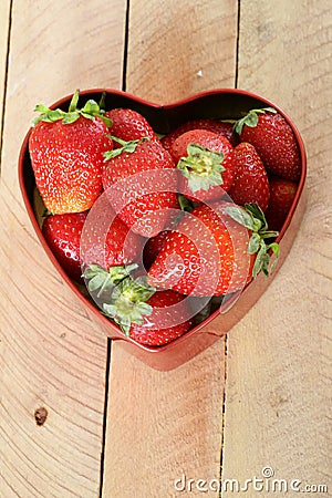 Fresh strawberries in a heart box