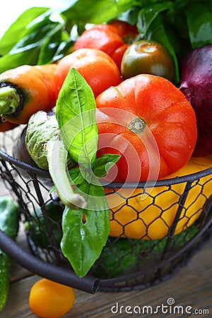 Fresh vegetables in metal basket