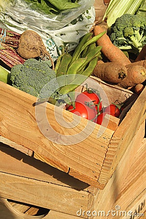 Fresh vegetables in a wooden box