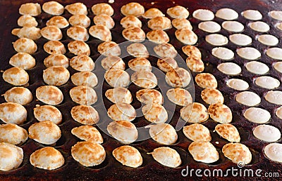Freshly baked traditional Dutch mini pancakes called