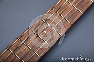 Fretboard on Acoustic Guitar Close-Up on Fifth Fret