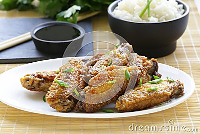 Fried chicken wings with spicy sauce