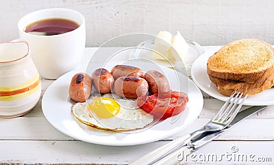 Fried egg, mini sausages