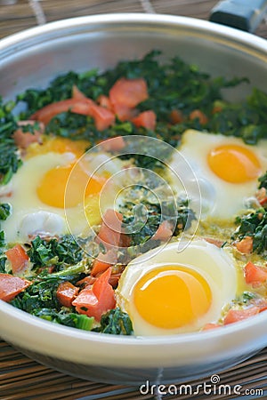 Fried eggs with spinach