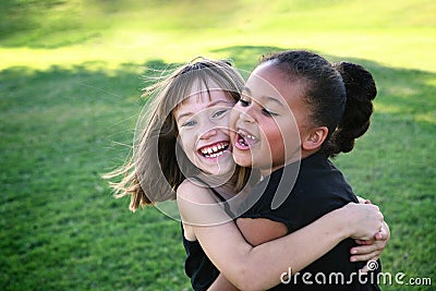 friends-multi-cultural-hugging-park-3679