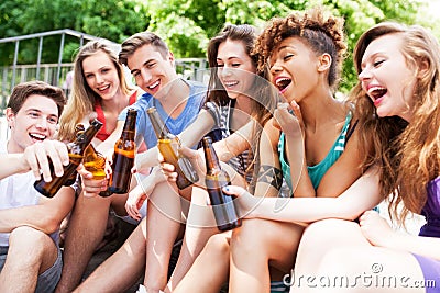 Friends toasting with beer