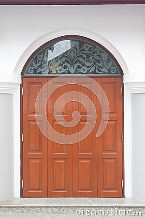 Front door made from glass and wood