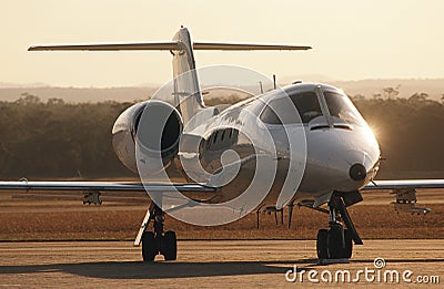 Front view Lear jet on tarmac