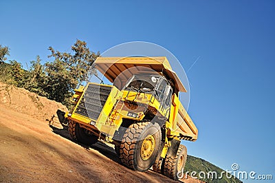 Front view of yellow tipper truck