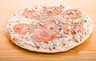 Frozen Pepperoni Pizza on Wood Cutting Board