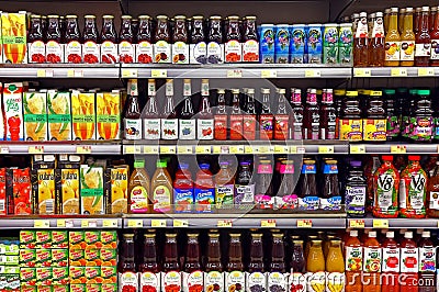 Fruit juices in bottles at supermarket