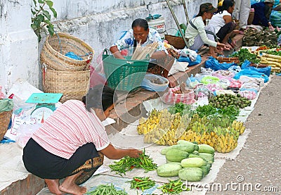 Workers at the fruit market,Luang Prabang,Laos