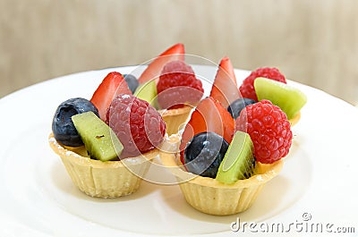Fruit Tart with berries and kiwi