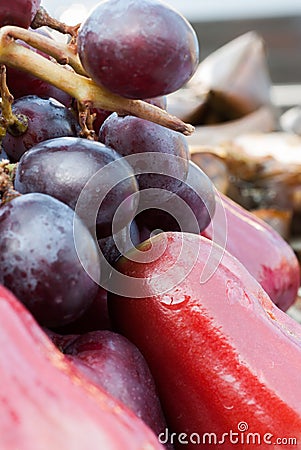 Fruit in tray with orange , grapes and rose apple