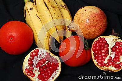 Fruits and vegetables on the black background