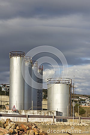 Fuel or gas storage tanks at harbour