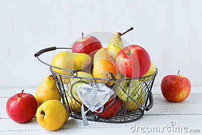 Full basket of apples and pears