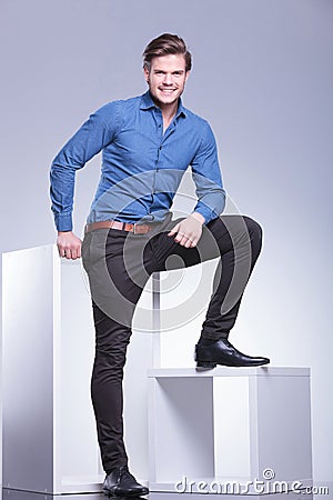 Full body picture of a relaxed smiling casual man