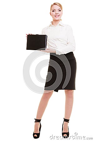 Full length of young businesswoman showing document case