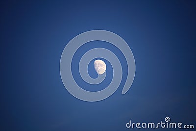 Full moon on the blue sky