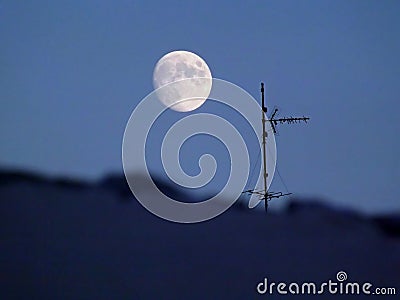 Full moon and blue sky