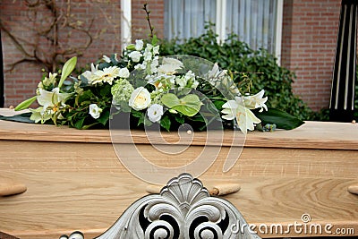 Funeral flowers on a casket