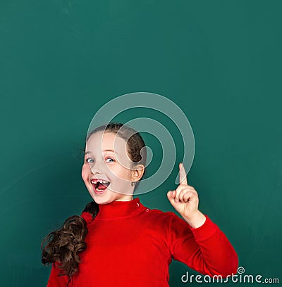 Funny girl and school desk