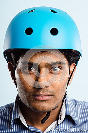 Funny man wearing cycling helmet portrait real people high defin