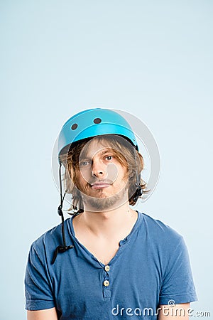 Funny man wearing cycling helmet portrait real people high defin