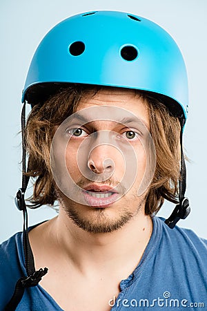 Funny man wearing cycling helmet portrait real people high defin