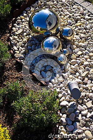 Garden decoration with silver mirror spheres