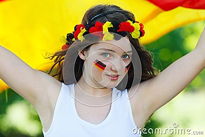 German soccer fan waving her flag