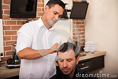 Getting a haircut from my barber
