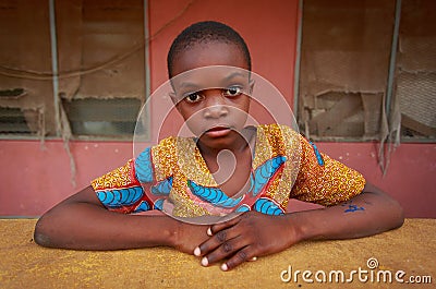 Ghana girl with unhappy looking face