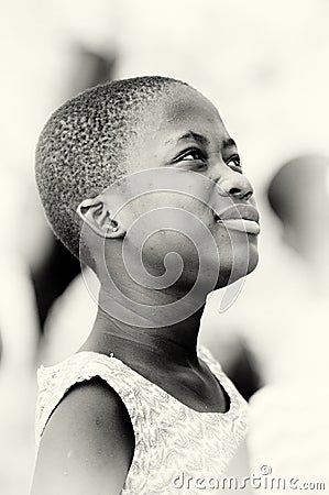 Ghanaian girl with a thinking face