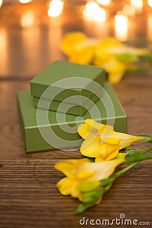 Gift box with flowers and evening lighting
