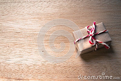 Gift box on wooden background